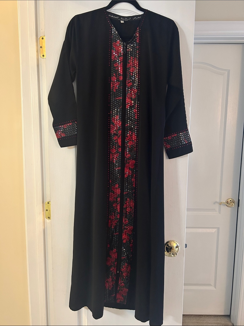 Elegant Black Long Sleeve Abaya with Red Floral Embellishment